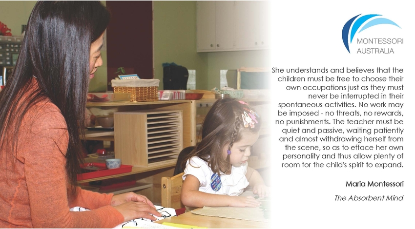 Teacher watching child at work in Montessori classroom