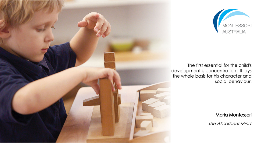 Boy in Montessori classroom constructing Roman Arch material